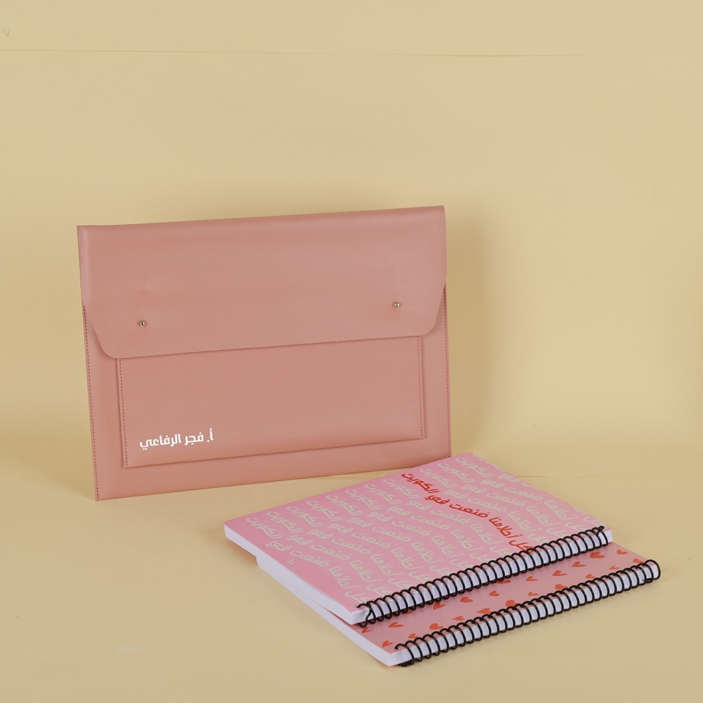 حقيبة لاب توب مع دفاتر